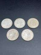 FIVE MORGAN SILVER DOLLARS