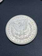 FIVE MORGAN SILVER DOLLARS