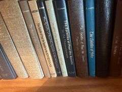 Book Shelf and Collection of John MacArthur 'Grace to You' Books, Commentaries, and Media