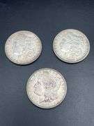 THREE MORGAN SILVER DOLLARS