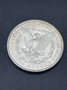 THREE MORGAN SILVER DOLLARS