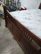QUEEN SIZE BED - HEADBOARD WITH FOOTBOARD AND RAILS AND SLATS - BOX SPRING AND MATTRESS WILL BE GIVEN TO BUYER IF WANTED