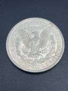 FIVE MORGAN SILVER DOLLARS