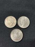 Three 1923 Peace Silver Dollars