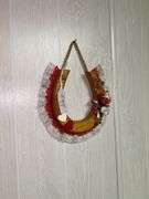 Assorted Decorative Items: Framed Artwork, Wall Sconces, and Horseshoe Decor