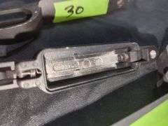 Assorted Rifle Parts: Triggers, Housing, and Magazine Release