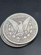 THREE MORGAN SILVER DOLLARS