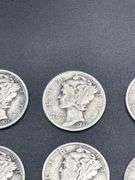 TWELVE MERCURY DIMES