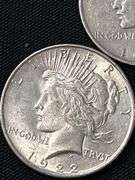 Three 1922 Peace Silver Dollars