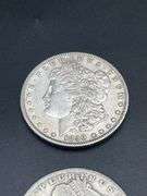 FOUR MORGAN SILVER DOLLARS