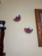 Framed Farm Aerial Photograph, Wooden Paper Towel Holder, and Watermelon Decorations