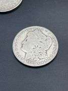 FOUR MORGAN SILVER DOLLARS