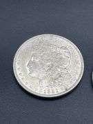 FIVE MORGAN SILVER DOLLARS