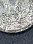 FIVE MORGAN SILVER DOLLARS