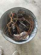 METAL TRASH CAN WITH SCRAP METAL