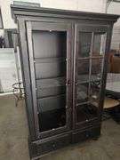 AMERICAN SIGNATURE - LIGHTED 2 DOOR CURIO CABINET - DISTRESSED LOOK - MISSING GLASS FOR LEFT SIDE DOOR - HAS 3 GLASS SHELVES AND 2 BOTTOM DRAWERS - 47X18X73
