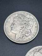 THREE MORGAN SILVER DOLLARS