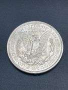 FIVE MORGAN SILVER DOLLARS