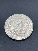 FIVE MORGAN SILVER DOLLARS