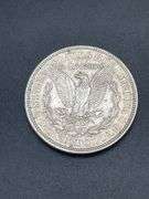 FIVE MORGAN SILVER DOLLARS