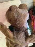 Assorted Plush Holiday Toys: Bears, Moose, and Santa