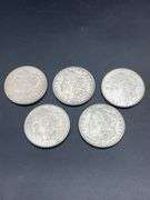 FIVE MORGAN SILVER DOLLARS