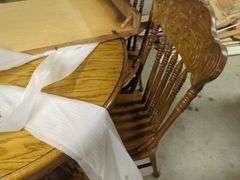 Extendable Round Wood Dining Table with Six Chairs