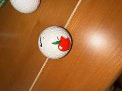 Golfing Memorabilia Lot - Balls, Figurines, and Crowfield Glass