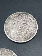 THREE MORGAN SILVER DOLLARS