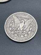 FOUR MORGAN SILVER DOLLARS
