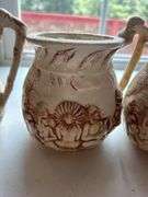 Set of Four "Shelah '84" Relief Design Pitchers
