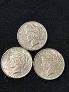Three 1922 Peace Silver Dollars