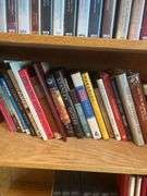 Book Shelf and Collection of John MacArthur 'Grace to You' Books, Commentaries, and Media