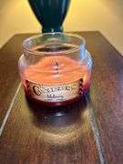 Dark Wood End Table with Candleberry Candle and Lamp