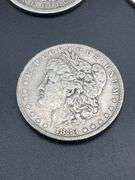 FOUR MORGAN SILVER DOLLARS