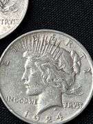 Three 1924 Peace Silver Dollars