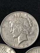 Three 1922 Peace Silver Dollars
