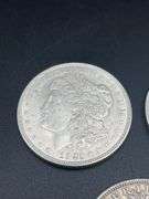 FIVE MORGAN SILVER DOLLARS