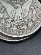 THREE MORGAN SILVER DOLLARS
