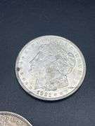 FIVE MORGAN SILVER DOLLARS
