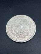 FIVE MORGAN SILVER DOLLARS
