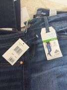 A VARIETY OF WOMENS JEANS- 1- PAIR OF JEAN SHORTS- SIZES 10- 12- 14- DIFFERENT BRANDS