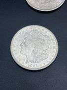 FIVE MORGAN SILVER DOLLARS