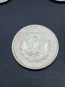 FIVE MORGAN SILVER DOLLARS