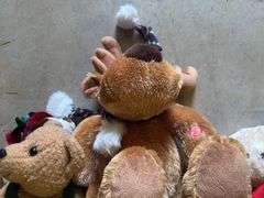 Assorted Plush Holiday Toys: Bears, Moose, and Santa