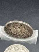TWO MORGAN SILVER DOLLARS