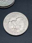 FOUR EISENHOWER DOLLARS