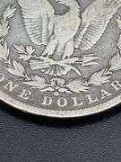 THREE MORGAN SILVER DOLLARS