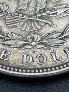 FIVE MORGAN SILVER DOLLARS