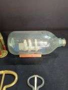 Bullet Casing Figurine, Ship in Bottle, & Musical Instruments